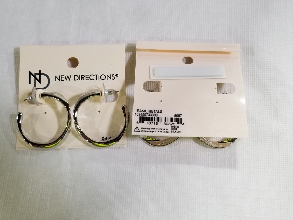 NV14BM PE SILVER TWSTHP EARRINGS